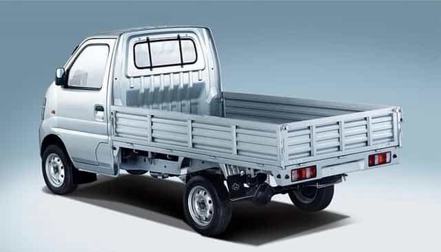 Uma Changan Picape Mini Star Cabine Simples em um material promocional, vista de costas.